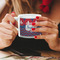 Patriotic Fleur de Lis Espresso Cup - 6oz (Double Shot) LIFESTYLE (Woman hands cropped)
