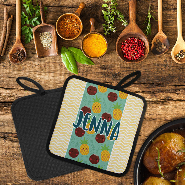 Pineapples and Coconuts Neoprene Pot Holder - Set of 2  LIFESTYLE (Flatlay)