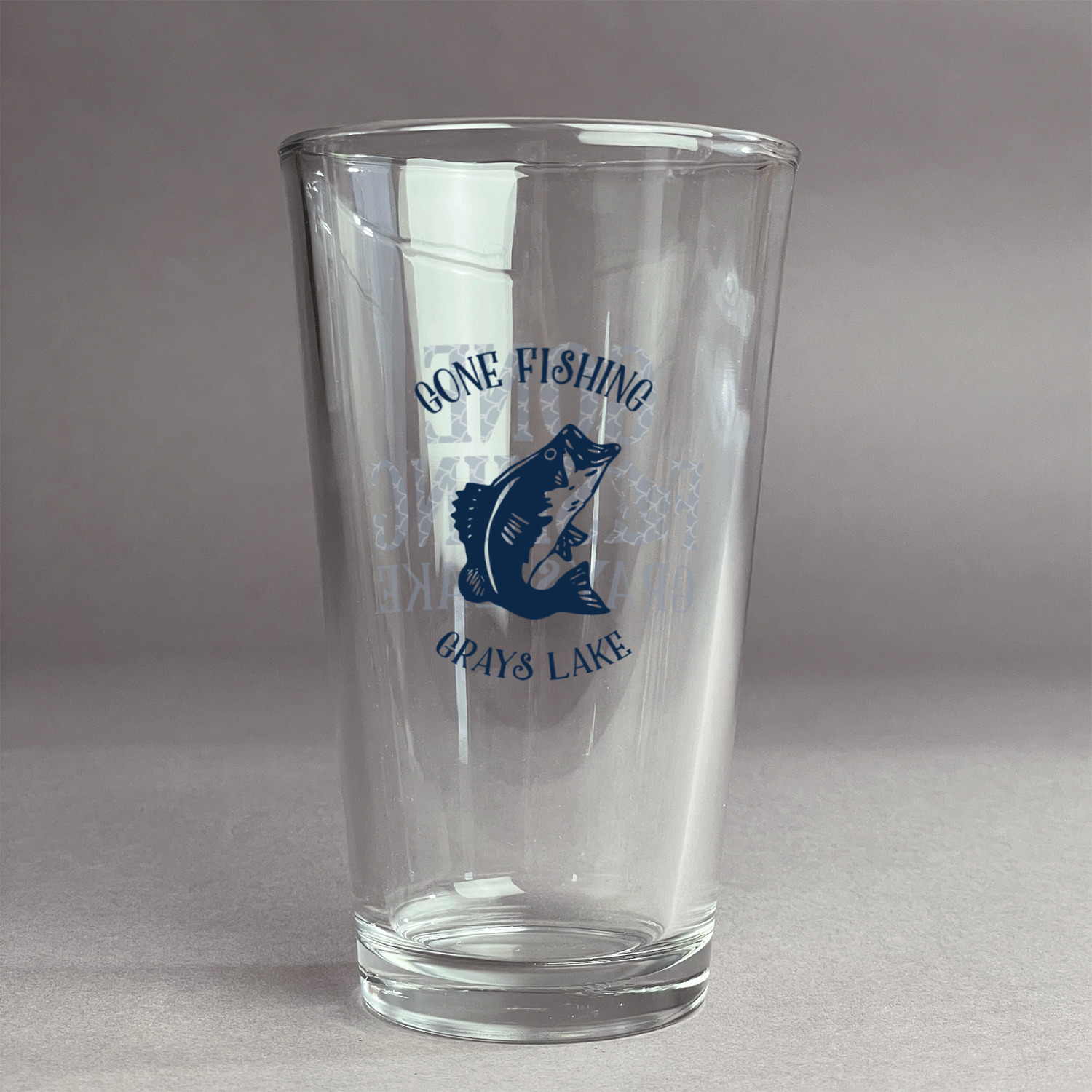 https://www.youcustomizeit.com/common/MAKE/1038229/Gone-Fishing-Pint-Glass-Two-Content-Front-Main.jpg?lm=1654889755