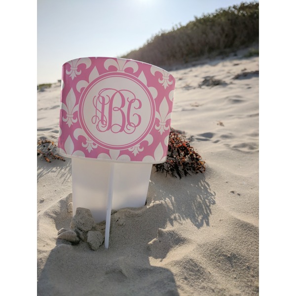 Fleur De Lis Beach Spiker white on beach with sand