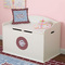 Welcome To The Neighborhood Round Wall Decal on Toy Chest