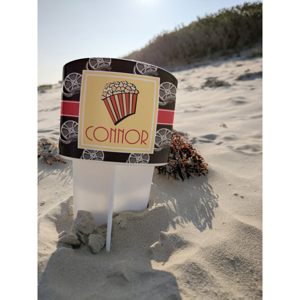 Movie Theater Beach Spiker white on beach with sand