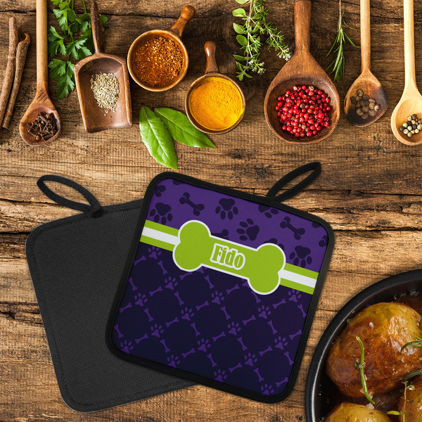 Pawprints & Bones Neoprene Pot Holder - Set of 2  LIFESTYLE (Flatlay)