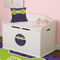 Pawprints & Bones Round Wall Decal on Toy Chest