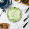 Tropical Leaves Border Round Stone Trivet - In Context View
