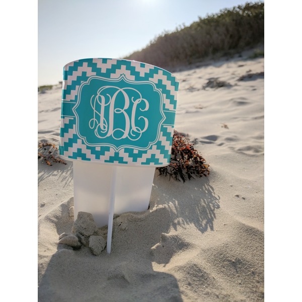 Pixelated Chevron Beach Spiker white on beach with sand