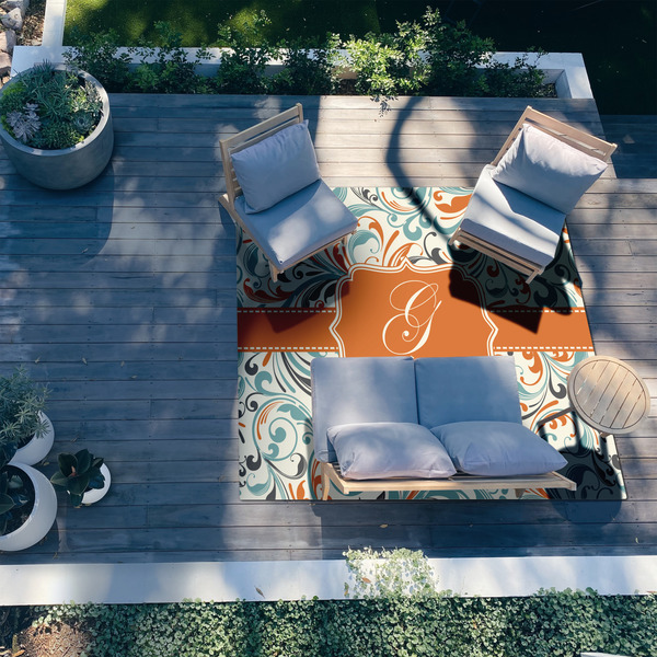 Orange & Blue Leafy Swirls 8'x10' Patio Rug - In context