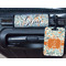 Orange & Blue Leafy Swirls Metal Luggage Tag & Handle Wrap - In Context