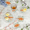 Orange & Blue Leafy Swirls Plastic Party Appetizer & Dessert Plates - In Context