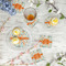 Orange & Blue Leafy Swirls Plastic Party Dinner Plates - In Context