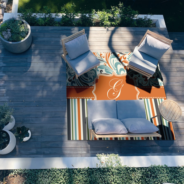 Orange Blue Swirls & Stripes 8'x10' Patio Rug - In context