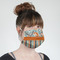Orange Blue Swirls & Stripes Mask - Quarter View on Girl