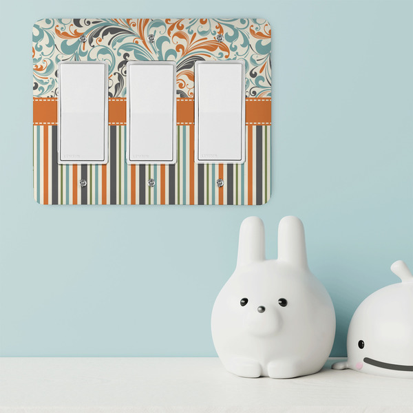 Orange Blue Swirls & Stripes Rocker Light Switch Covers - Triple - IN CONTEXT