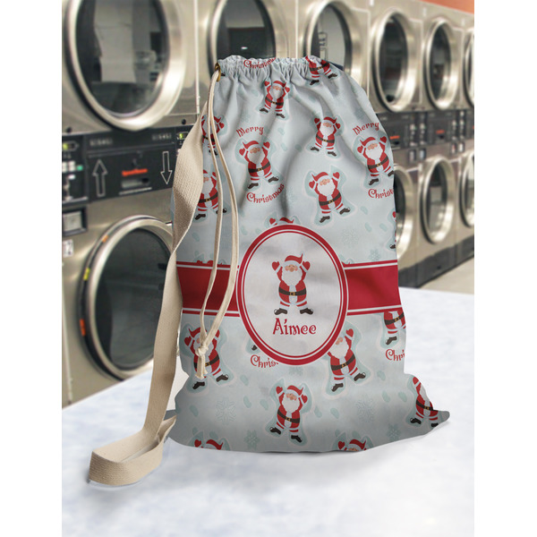 Santa Clause Making Snow Angels Laundry Bag in Laundromat