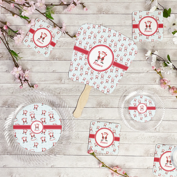 Santa Clause Making Snow Angels Party Supplies Combination Image - All items - Plates, Coasters, Fans