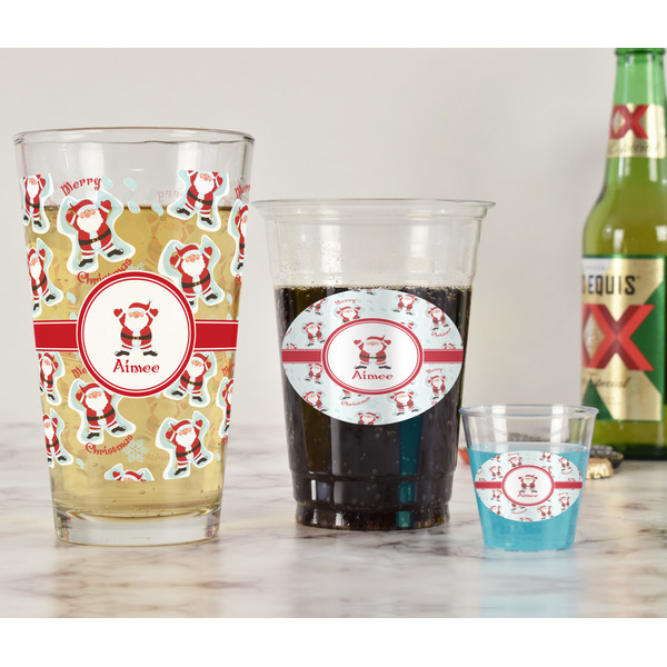 Santa Clause Making Snow Angels Pint Glass - Full Fill w Transparency - In Context