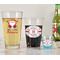 Santa Clause Making Snow Angels Pint Glass - Two Content - In Context