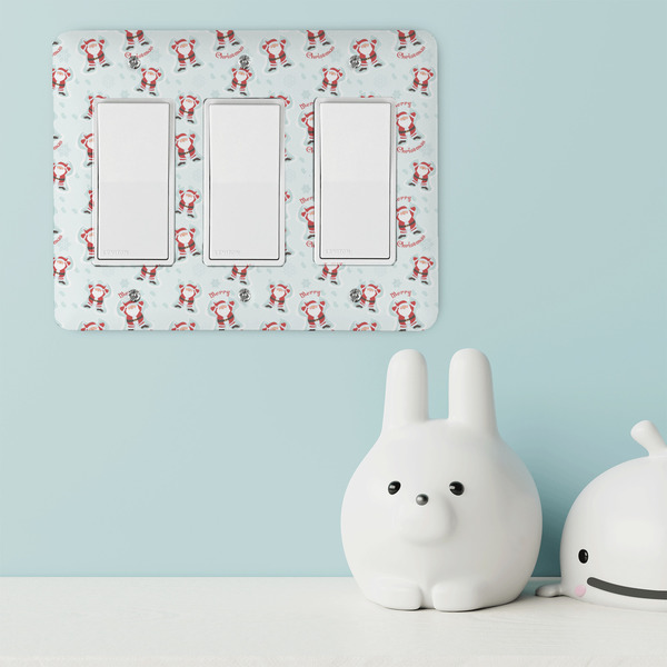 Santa Clause Making Snow Angels Rocker Light Switch Covers - Triple - IN CONTEXT
