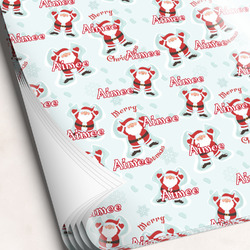 Santa Clause Making Snow Angels Wrapping Paper Sheets (Personalized)