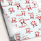 Santa Clause Making Snow Angels Wrapping Paper - 5 Sheets