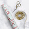 Santa Clause Making Snow Angels Wrapping Paper Roll - Matte - In Context