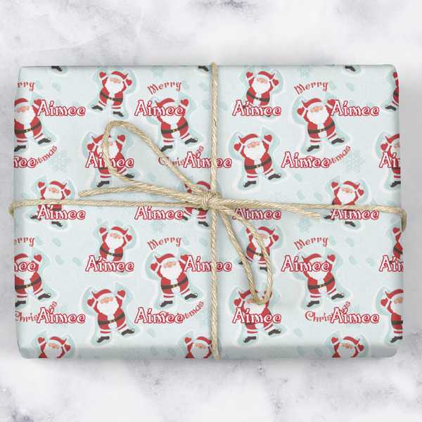 Santa Clause Making Snow Angels Wrapping Paper Roll - Matte - Wrapped Box
