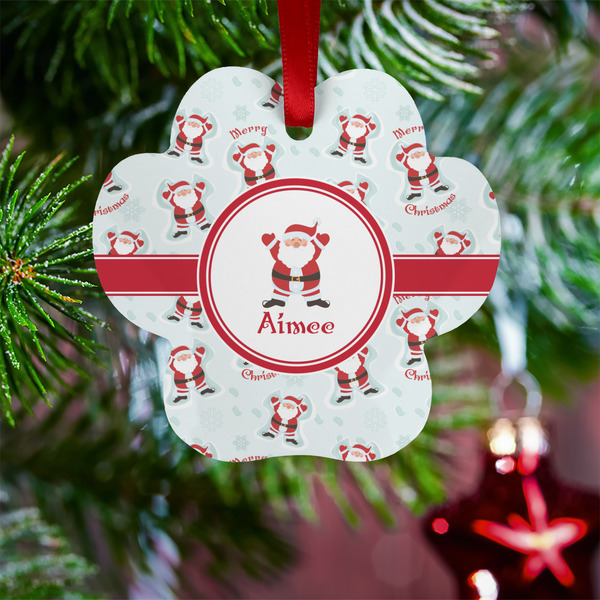 Santa Clause making snow angels Metal Paw Ornament - Lifestyle