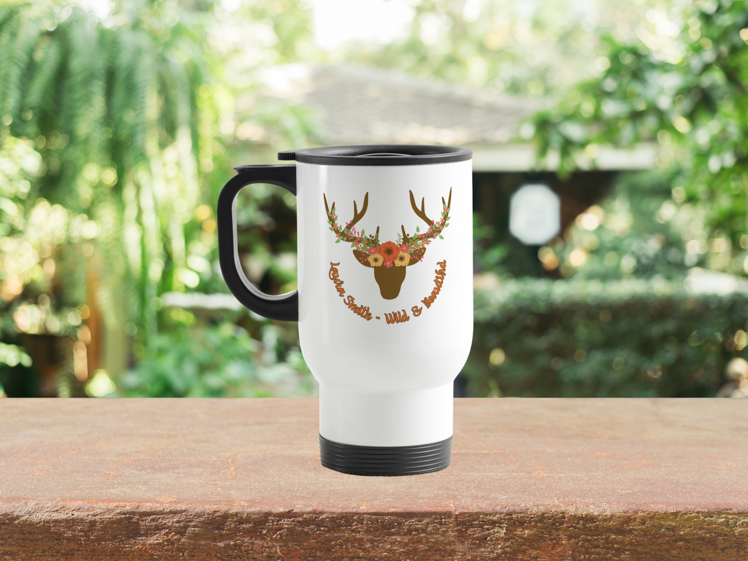 https://www.youcustomizeit.com/common/MAKE/1742200/Floral-Antler-Stainless-Steel-Travel-Mug-with-Handle-Lifestyle.jpg?lm=1666195539