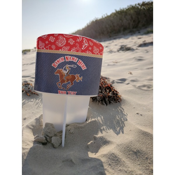 Western Ranch Beach Spiker white on beach with sand