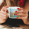 Superhero in the City Espresso Cup - 6oz (Double Shot) LIFESTYLE (Woman hands cropped)