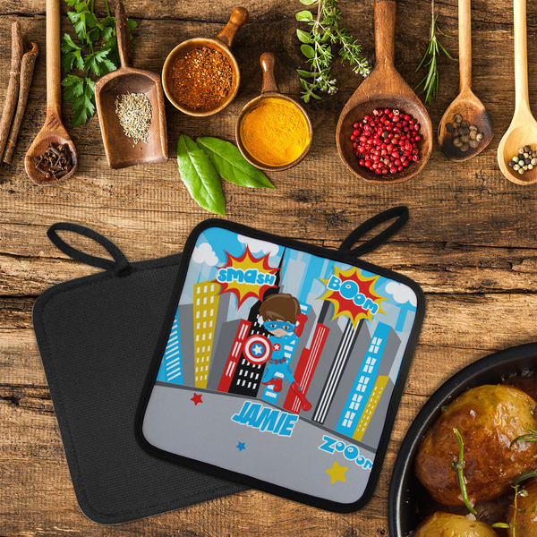 Superhero in the City Neoprene Pot Holder - Set of 2  LIFESTYLE (Flatlay)