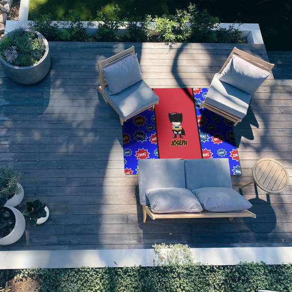 Superhero 5'x7' Patio Rug - In context
