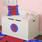 Superhero Round Wall Decal on Toy Chest