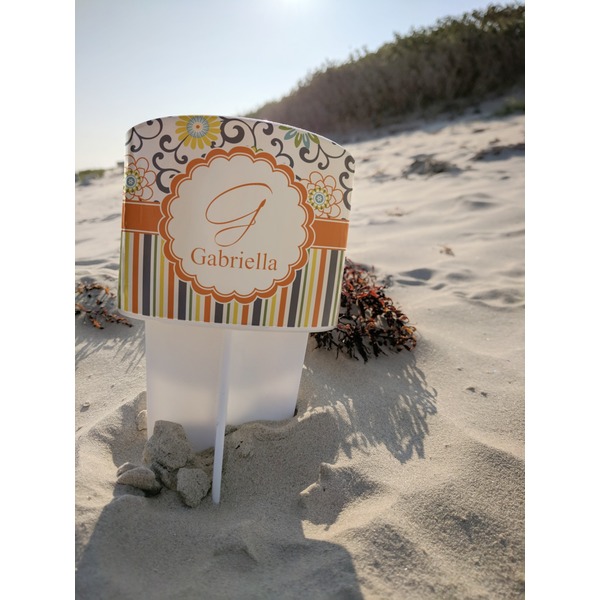 Swirls, Floral & Stripes Beach Spiker white on beach with sand