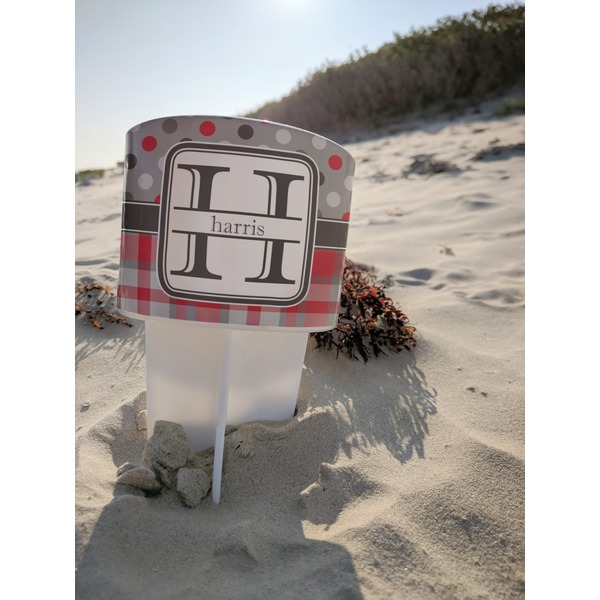 Red & Gray Dots and Plaid Beach Spiker white on beach with sand