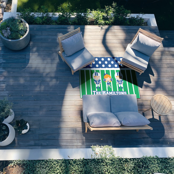 Football 4'x6' Patio Rug - In context