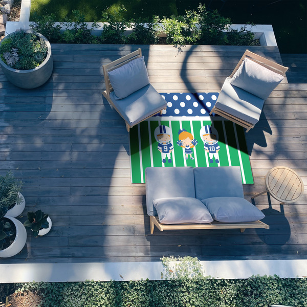Football 5'x7' Patio Rug - In context