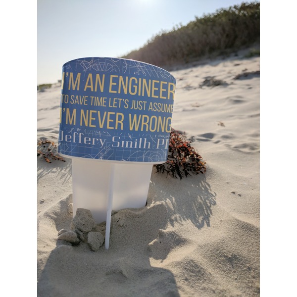 Engineer Quotes Beach Spiker white on beach with sand