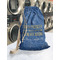 Engineer Quotes Laundry Bag in Laundromat