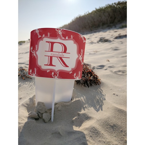 Crawfish Beach Spiker white on beach with sand