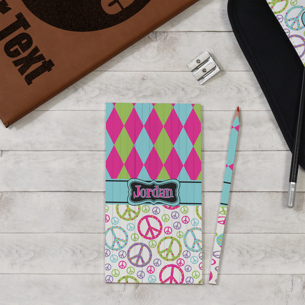 Harlequin & Peace Signs Colored Pencils - In Context