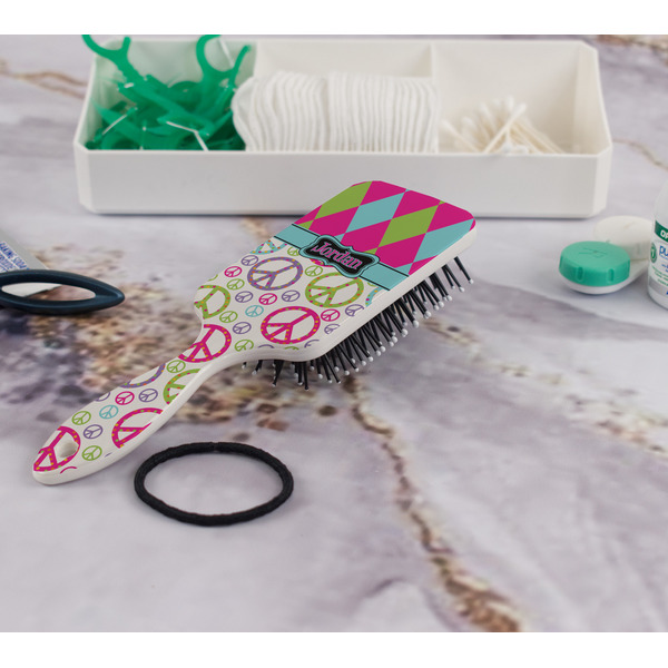 Harlequin & Peace Signs Hair Brush - In Bathroom