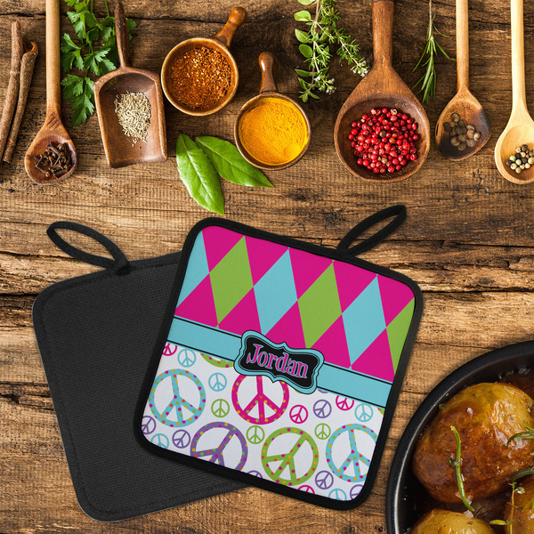 Harlequin & Peace Signs Neoprene Pot Holder - Set of 2  LIFESTYLE (Flatlay)