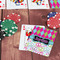 Harlequin & Peace Signs On Table with Poker Chips