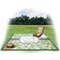 Wild Daisies Picnic Blanket - with Basket Hat and Book - in Use