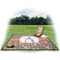 Fox Trail Floral Picnic Blanket - with Basket Hat and Book - in Use