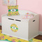 Pink Flamingo Round Wall Decal on Toy Chest