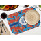 Blue Parrot Octagon Placemat - Single front (LIFESTYLE) Flatlay