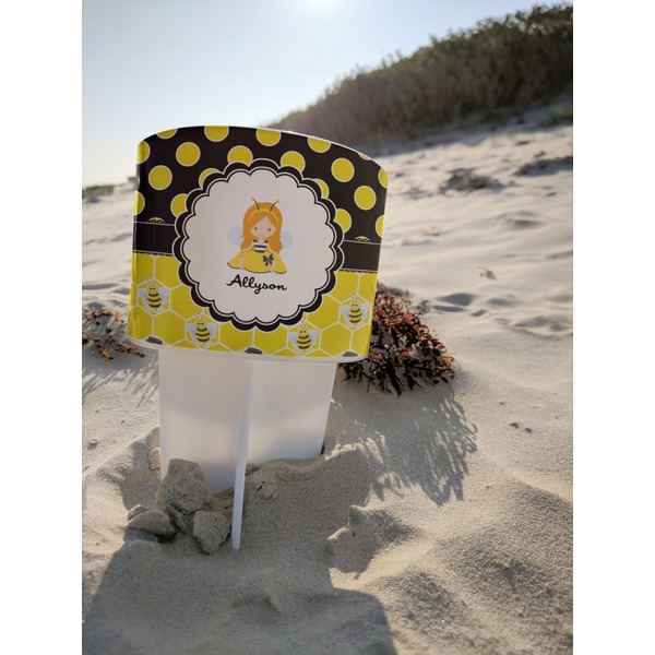 Honeycomb, Bees & Polka Dots Beach Spiker white on beach with sand