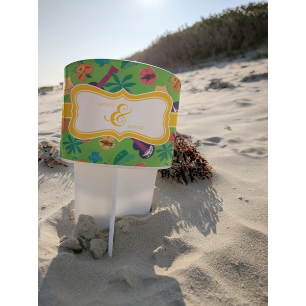 Luau Party Beach Spiker white on beach with sand